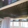 學校木紋波浪造型鋁方通_圖書館裝飾造型鋁方通